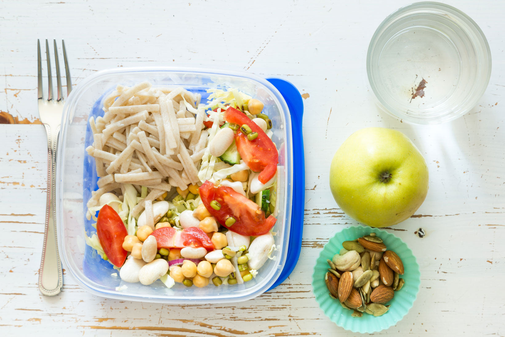 Healthy meal with protein, vegetables, fruit and nuts