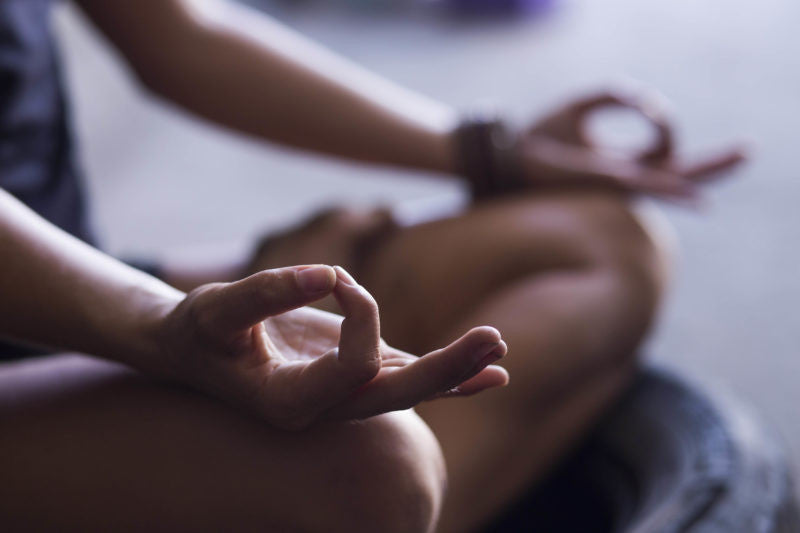 Person sitting in meditation