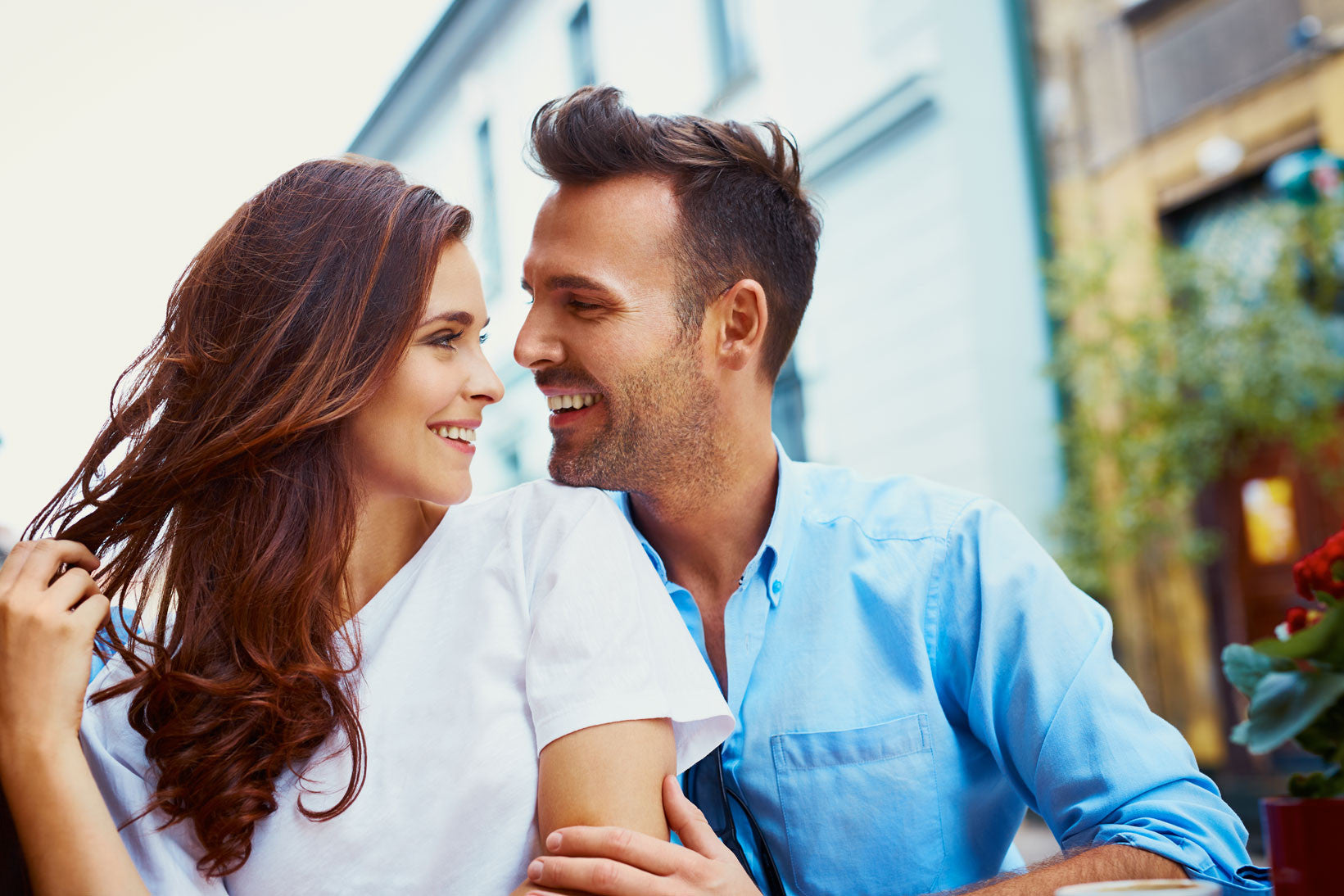 Man and woman smiling at each other