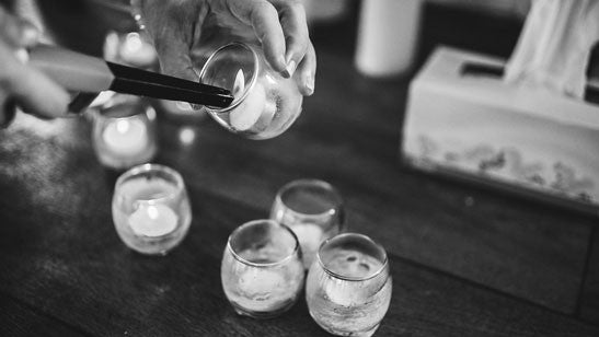 Small candles being lit