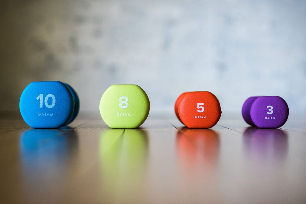 A set of colorful dumbbell weights
