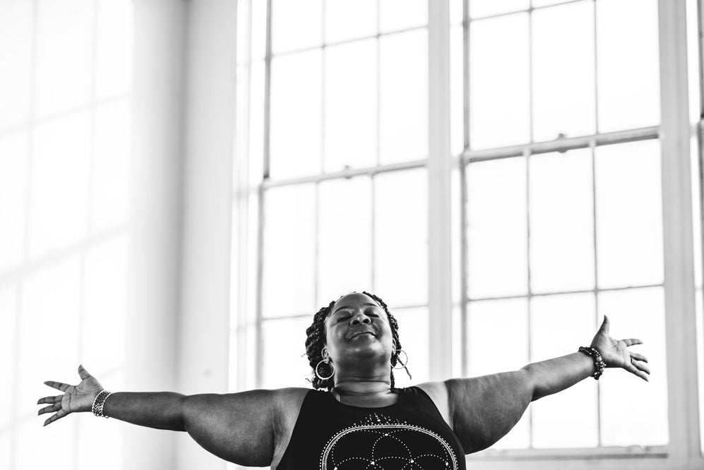 Woman extending her arms open