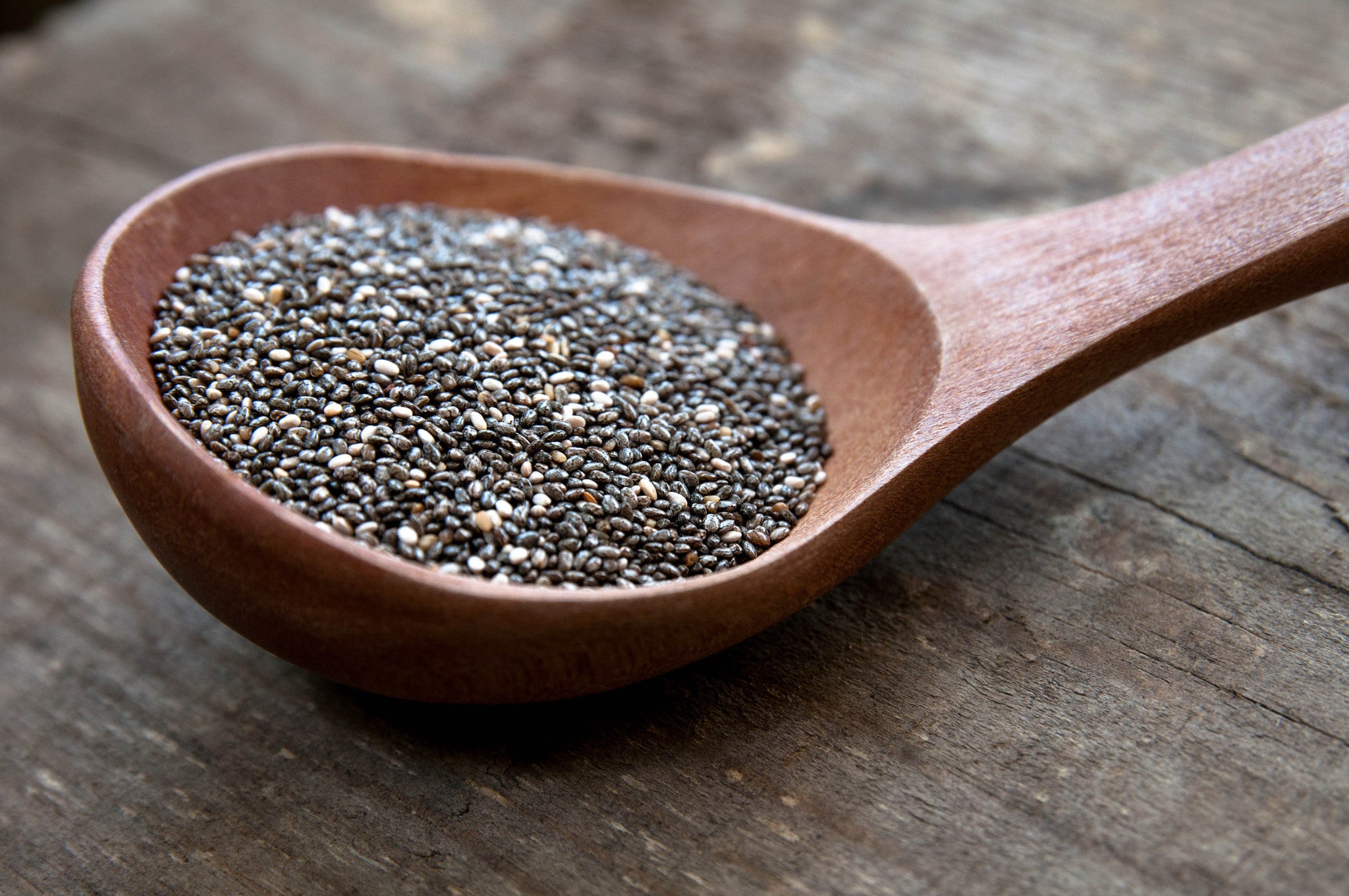 Seeds in a big wooden spoon