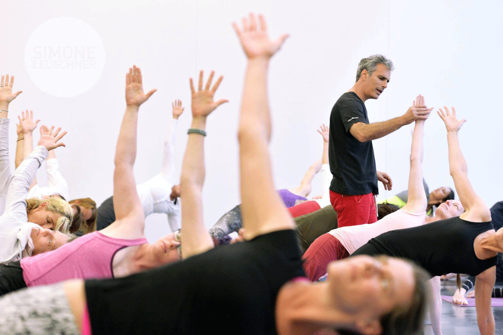 Power Yoga Founder Bryan Kest teaches a yoga class