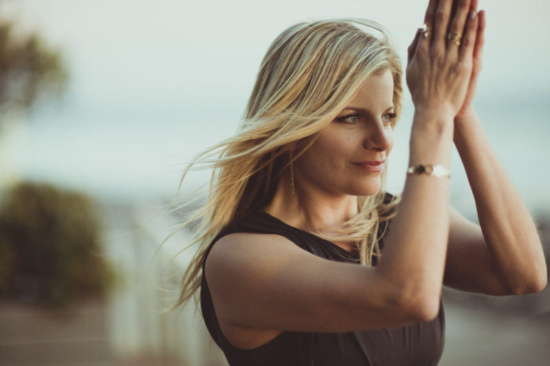 Blonde woman wearing a black shirt