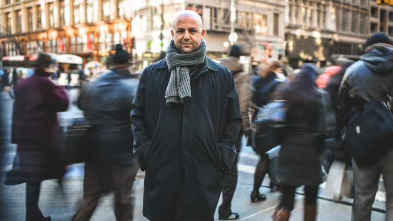 Man standing outside in the city