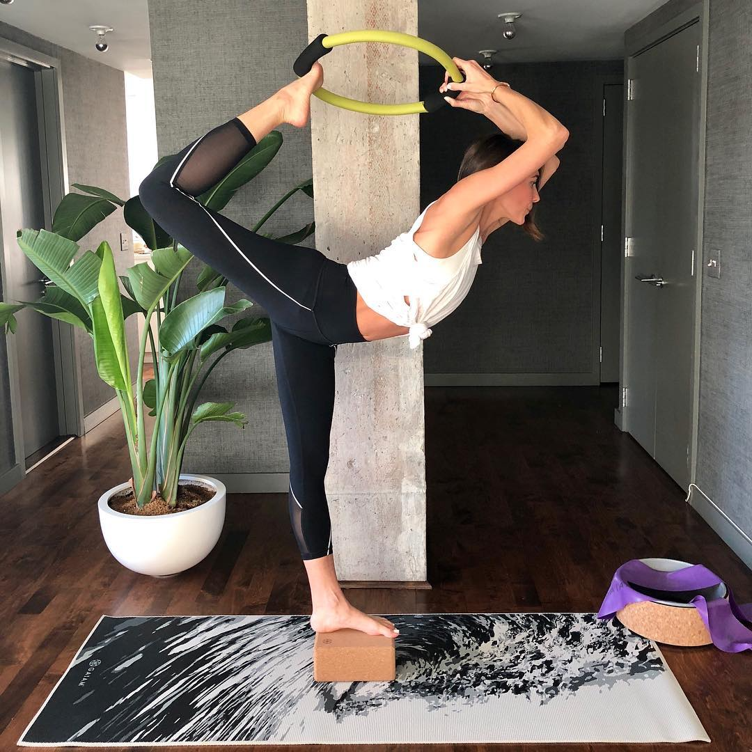 Melissa Wood doing dancers pose using Gaiam props