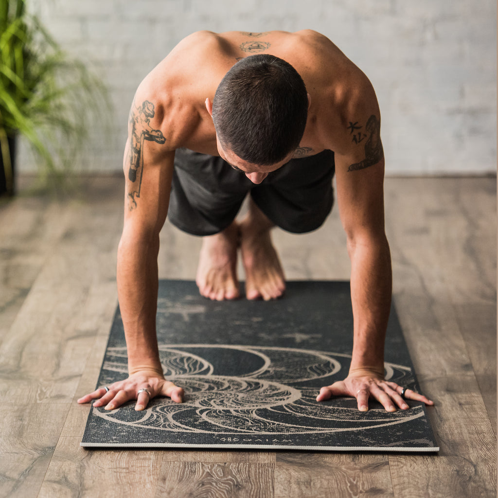 Man in Plank Pose on mat