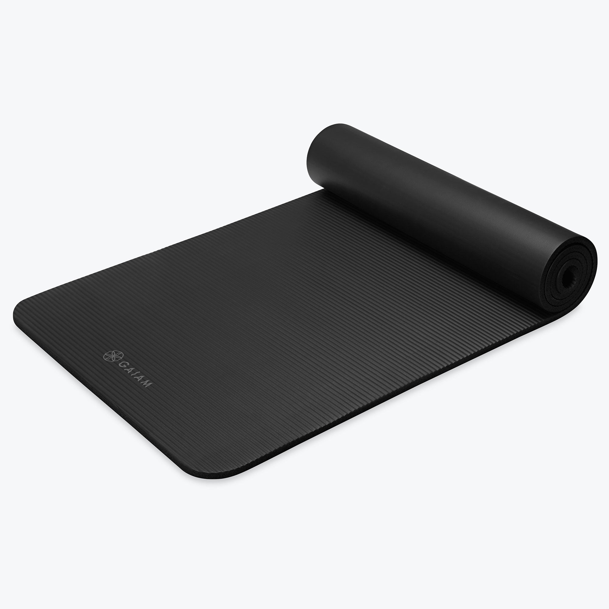 fitness mat black rolled up