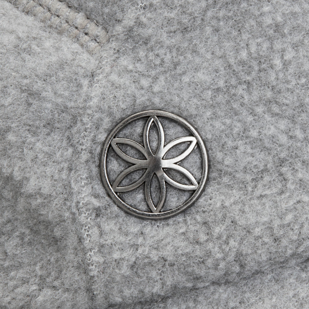 Gaiam Cozy Fleece Hat logo closeup