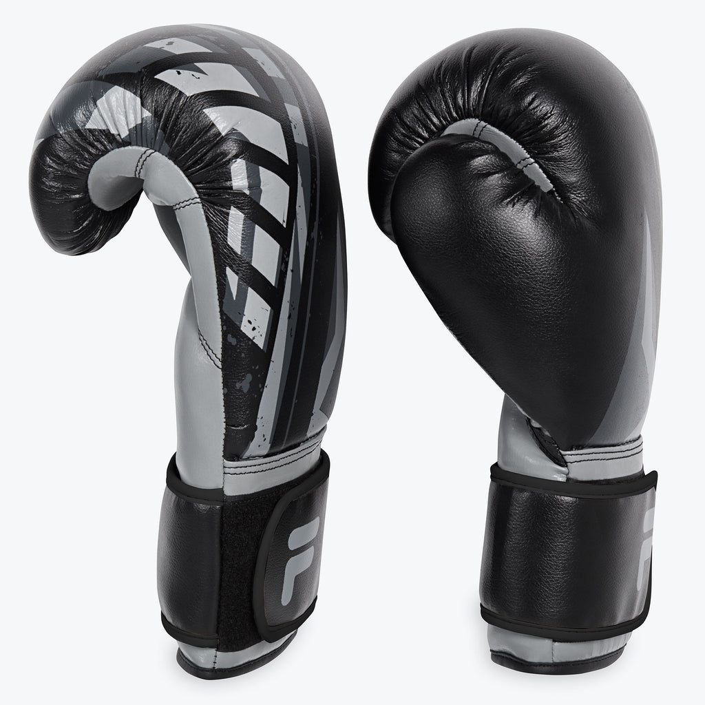 grey and black boxing gloves side view
