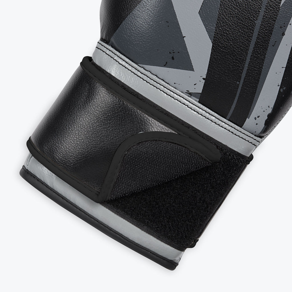 grey and black boxing gloves velcro closure