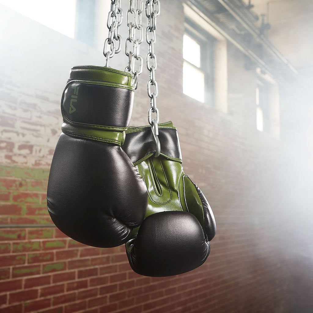 green boxing gloves hanging