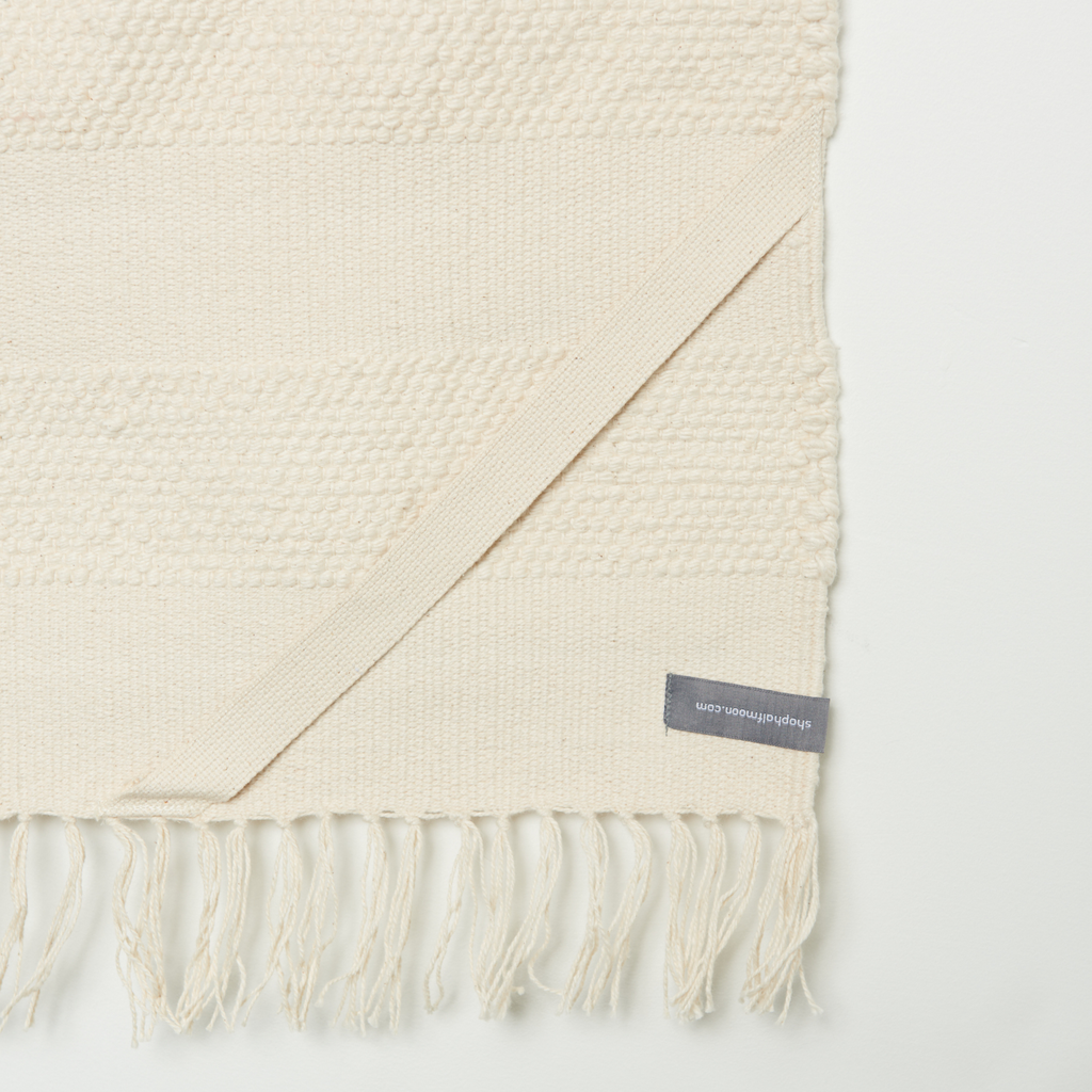 Halfmoon Cotton Practice Rug corner strap closeup