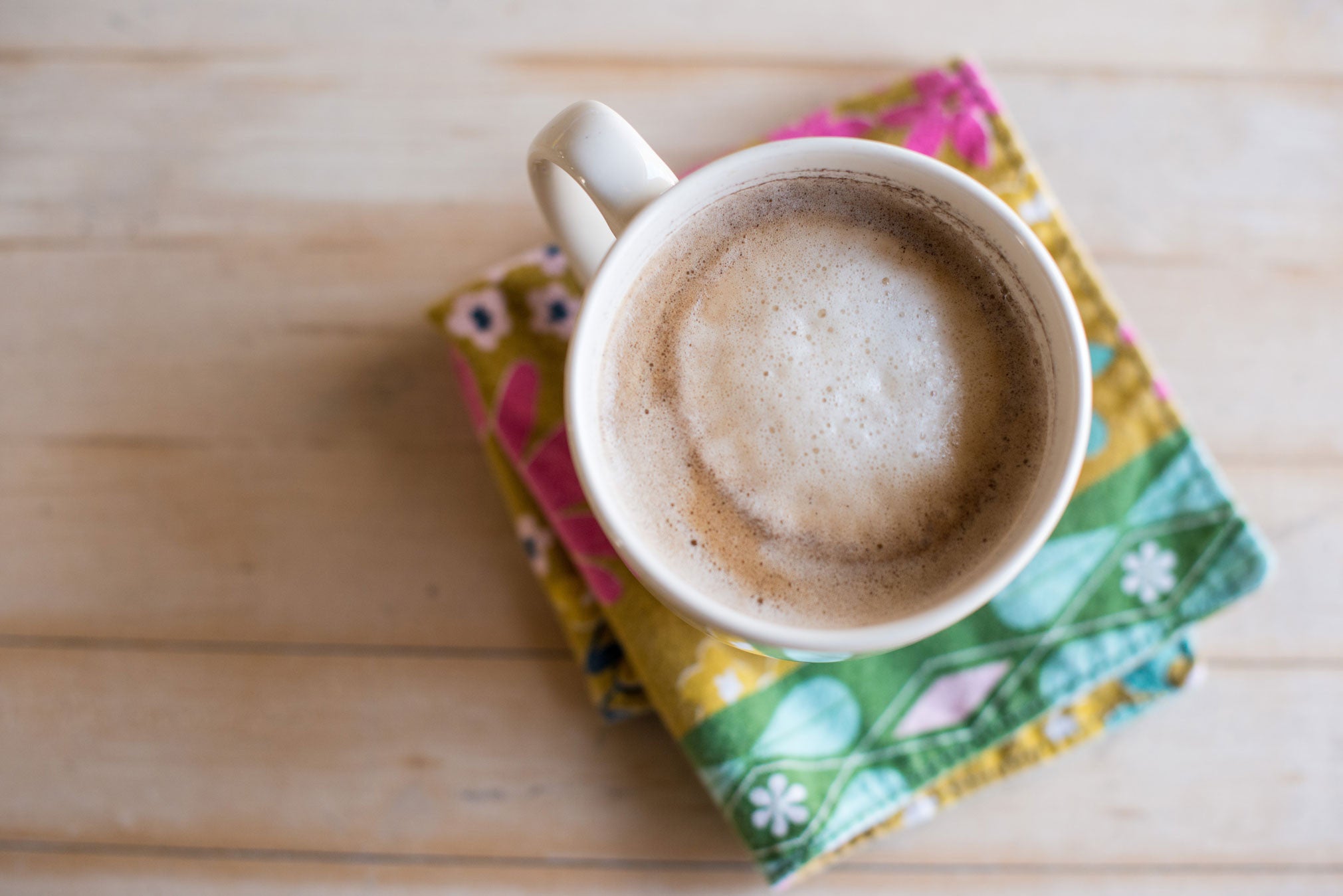 Cup of coffee on a wood table