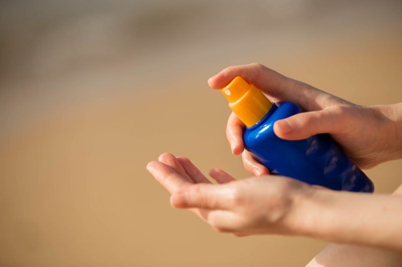 Bottle of spray sunscreen