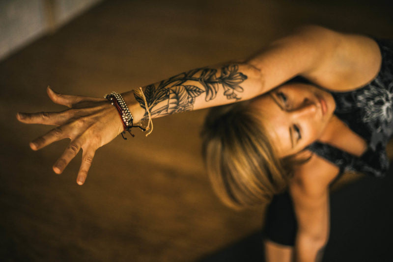 Woman in extended side-angle yoga pose