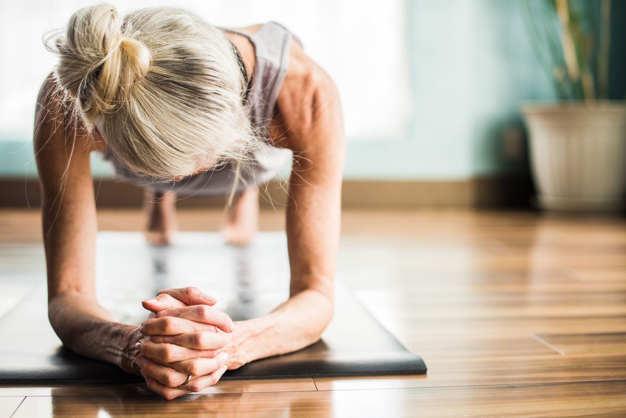 Woman holding plank pose 