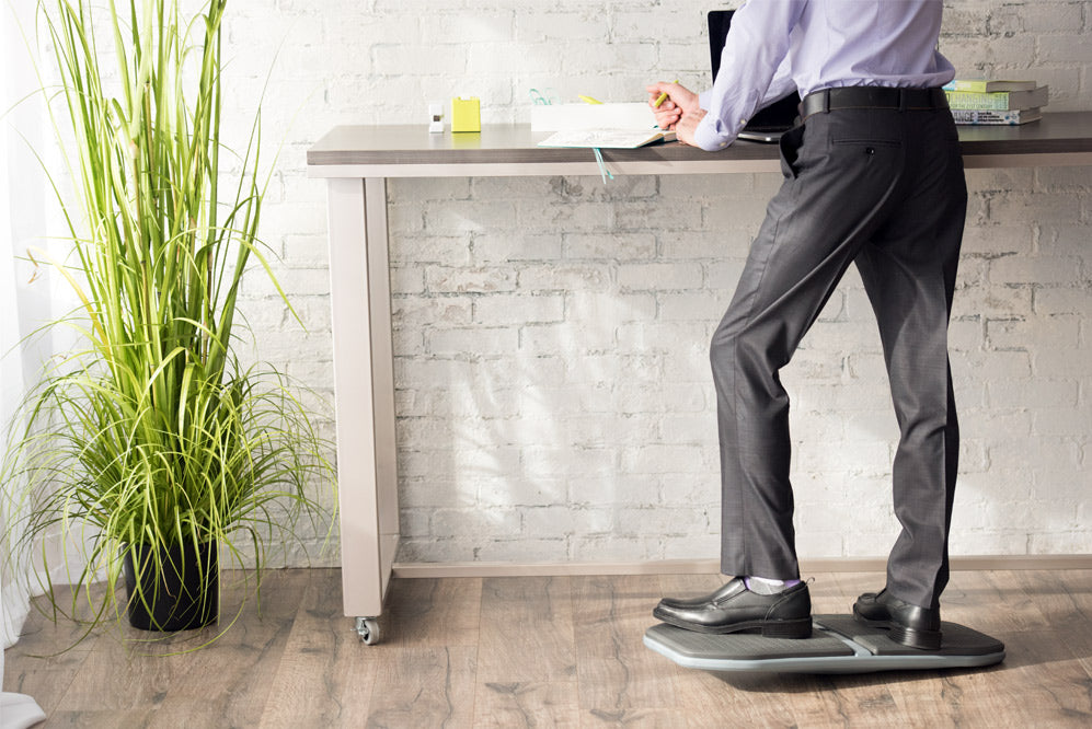 Man standing on a balance board