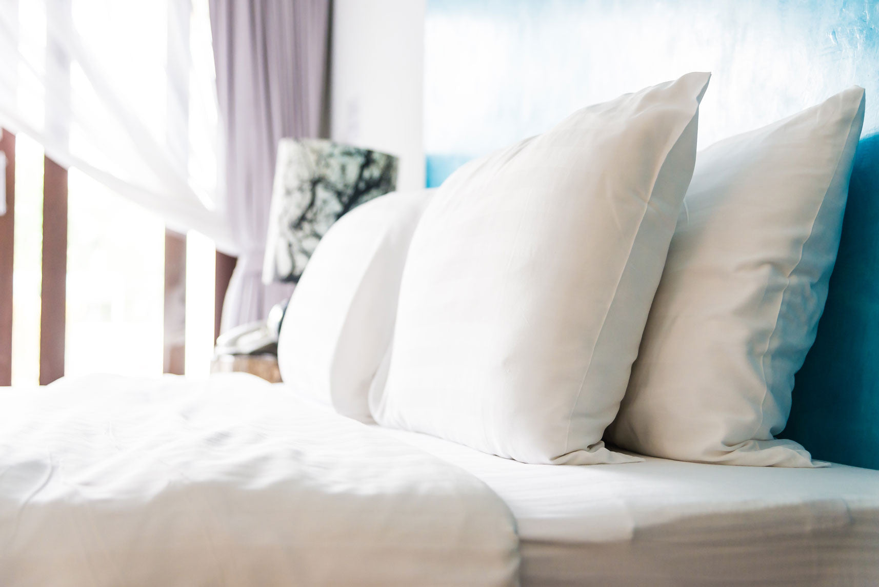 White pillows and sheets on a bed