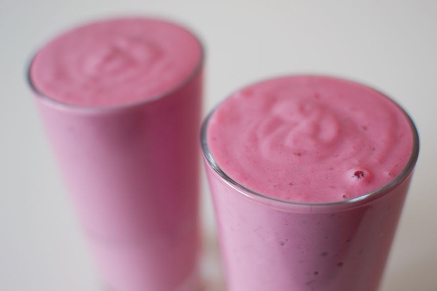 Two pink fruit smoothies