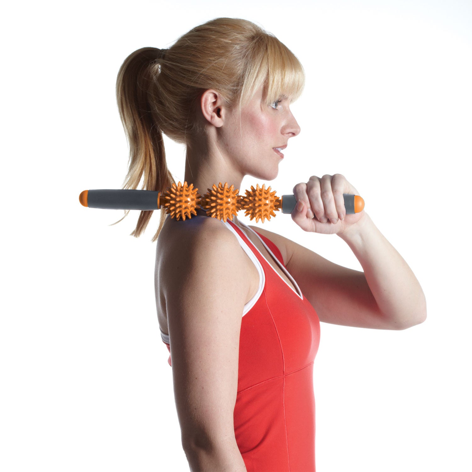 Shoulder massaging with the Restore Pressure Point Massager