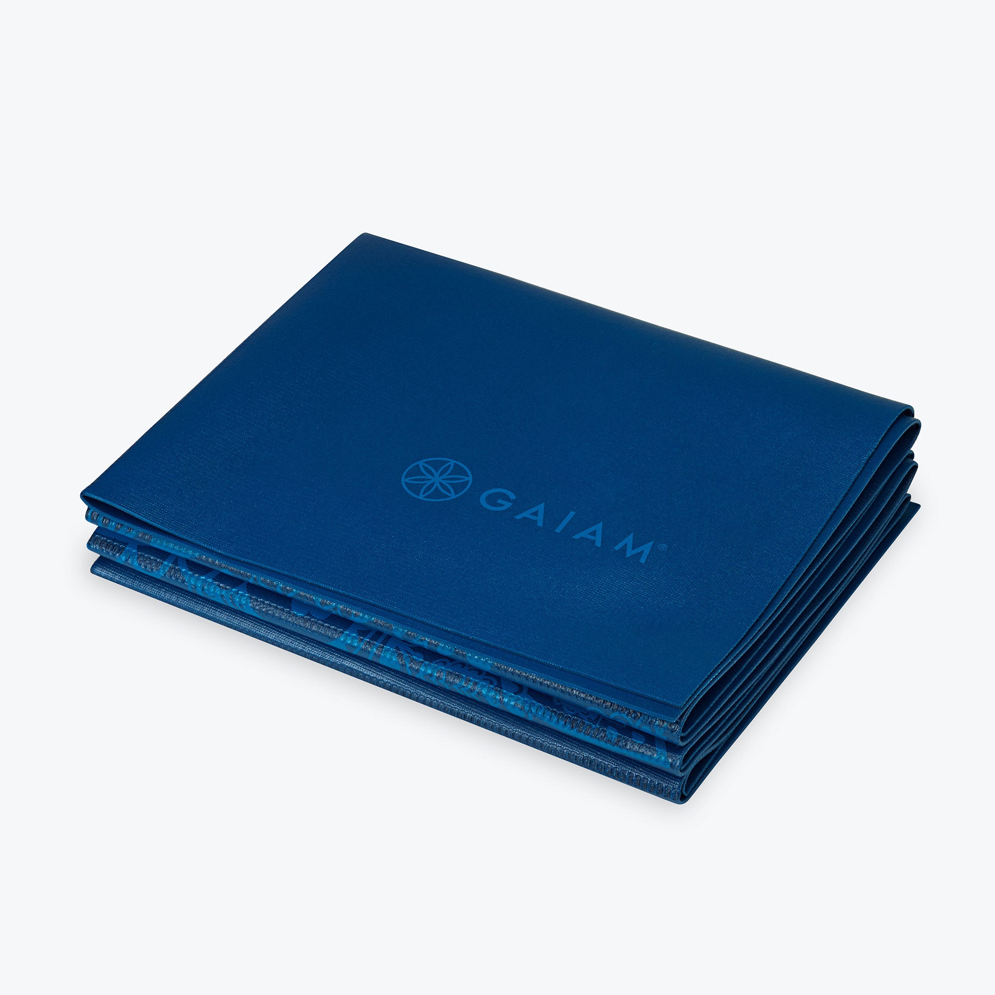 https://www.gaiam.com/cdn/shop/products/05-62214_FoldableMat_BlueSundial_D.jpg?v=1668615913