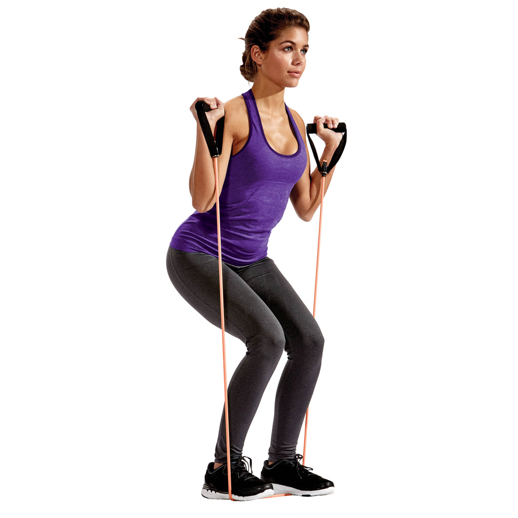 Hannah Ann squatting with resistance cords