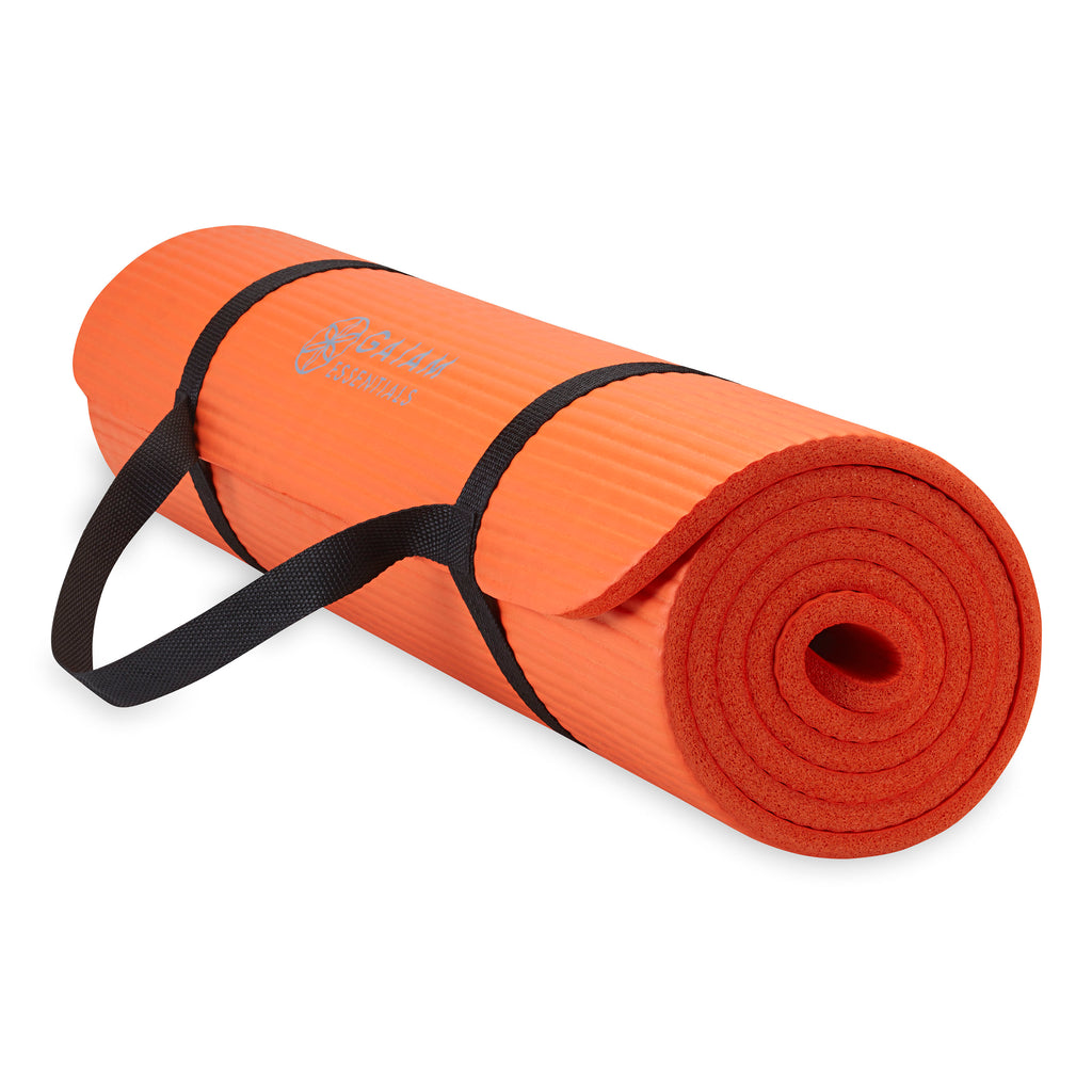 Gaiam Essentials Fitness Mat & Sling (10mm) Orange rolled with sling angle
