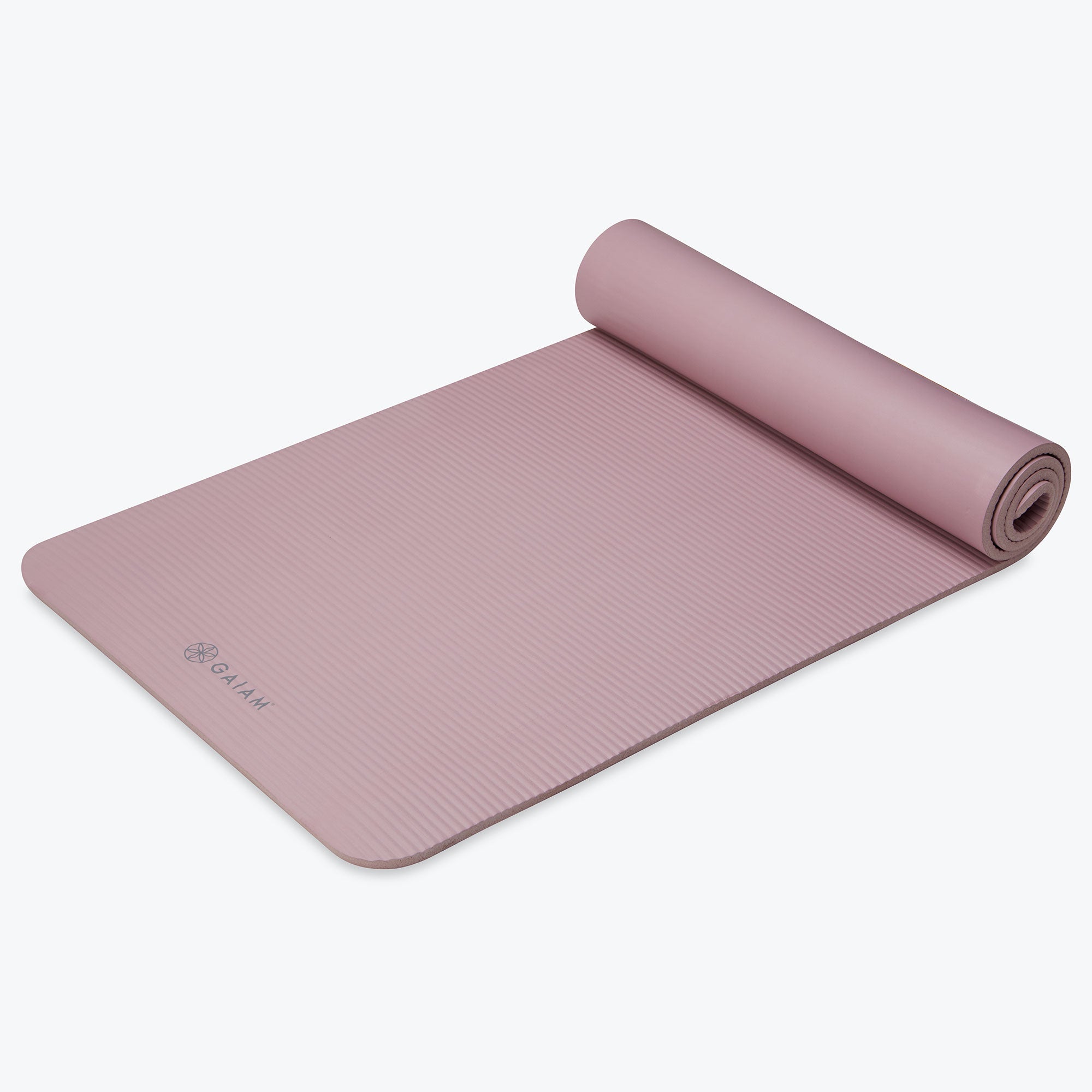 fitness mat purple rolled up